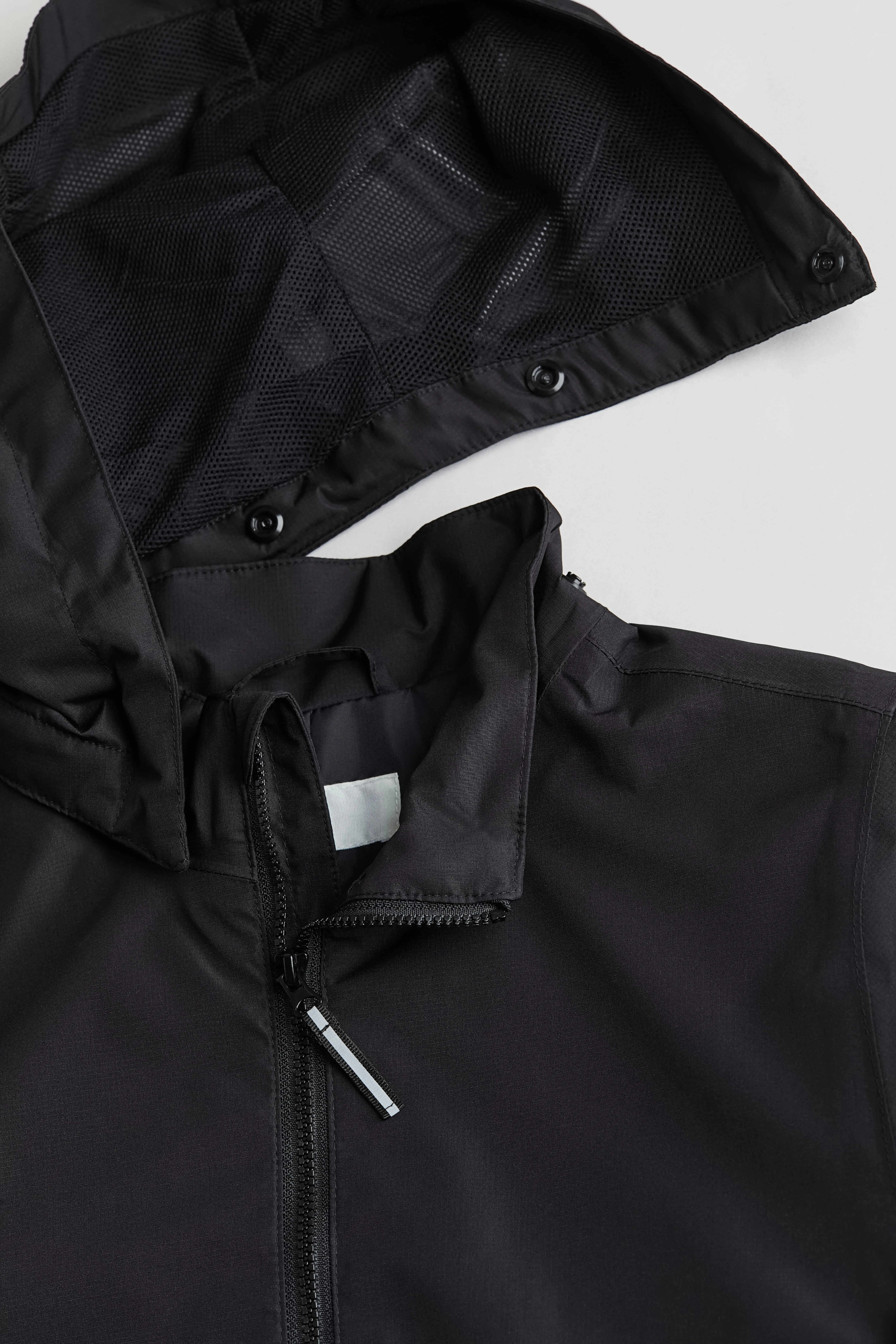 Lightweight rain jacket - Long sleeve - Regular length - Black - Kids | H&M GB