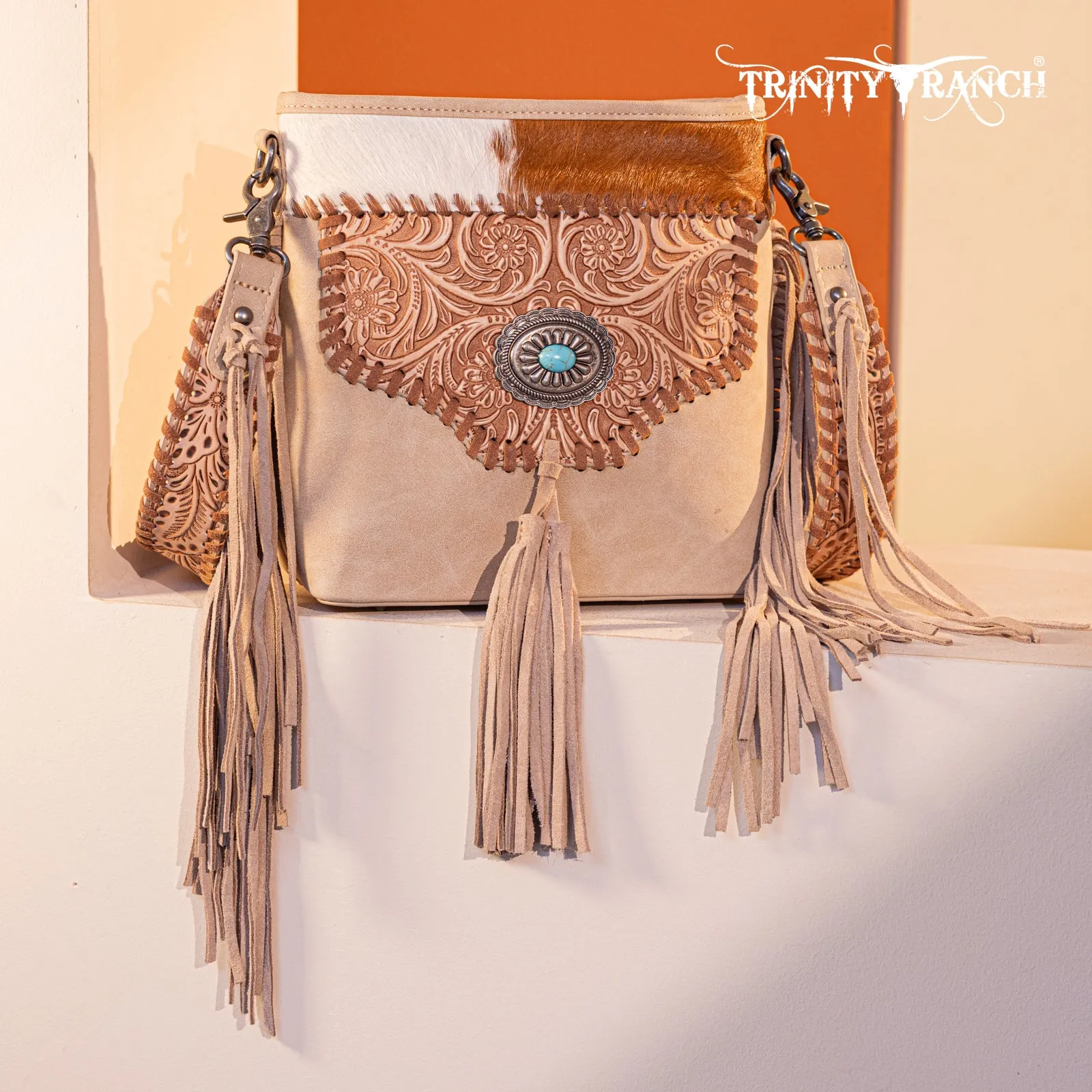 TR177G-9360  Trinity Ranch Hair-On Cowhide Floral Tooled  Concealed Carry Crossbody Bag - Tan