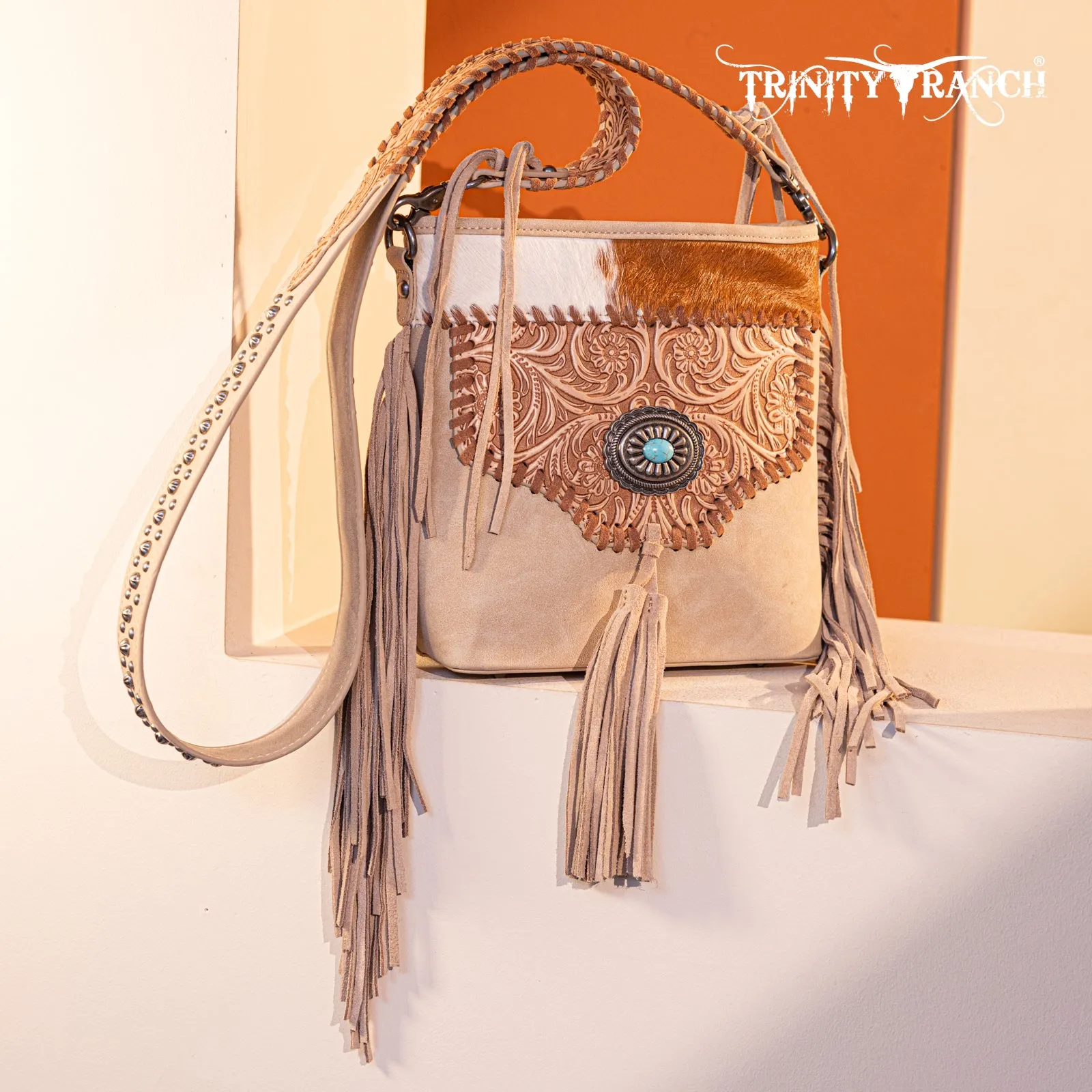 TR177G-9360  Trinity Ranch Hair-On Cowhide Floral Tooled  Concealed Carry Crossbody Bag - Tan